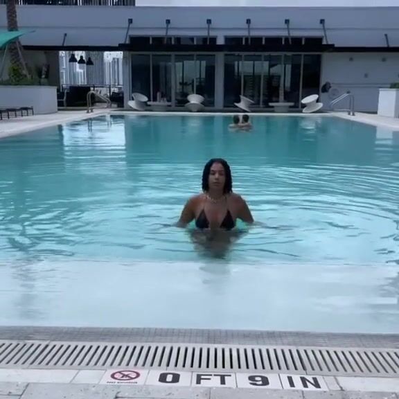 Amirah dyme walking at pool