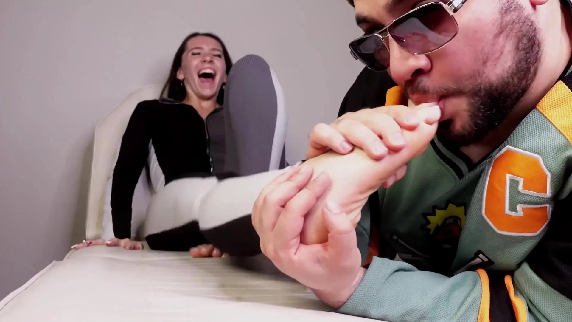 ticklish girl get her feet worshiped