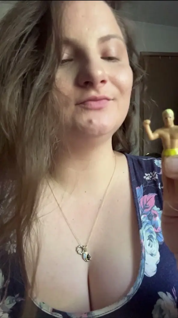 Giantess plays with tiny