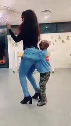 Midget dance with big tall ass woman