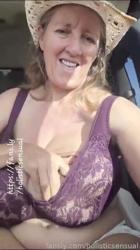 Busty Petra topless in the car