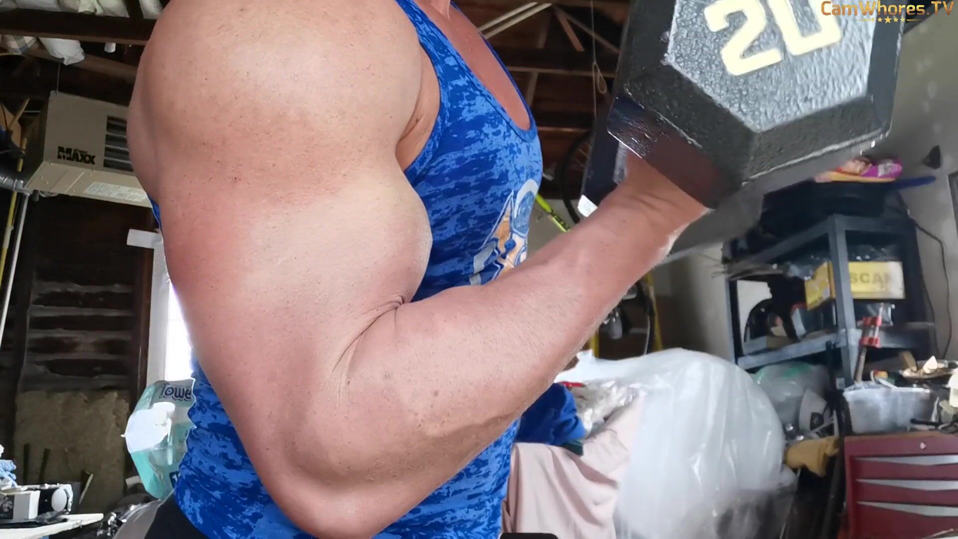 fbb Michelle pumps and measures her peaked biceps