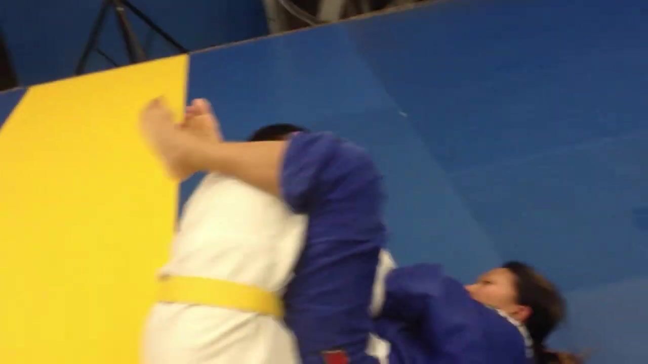 Adult women vs young man jiu jitsu