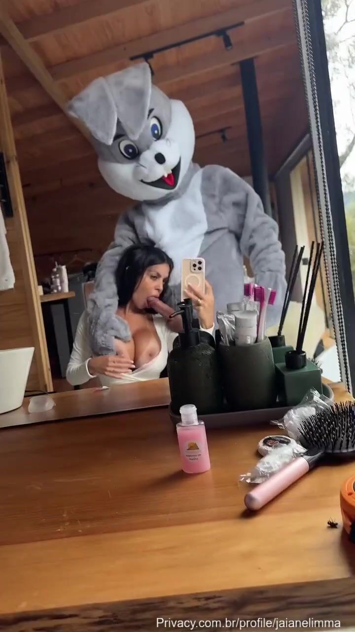 Jaiane sucks a rabbit's cock