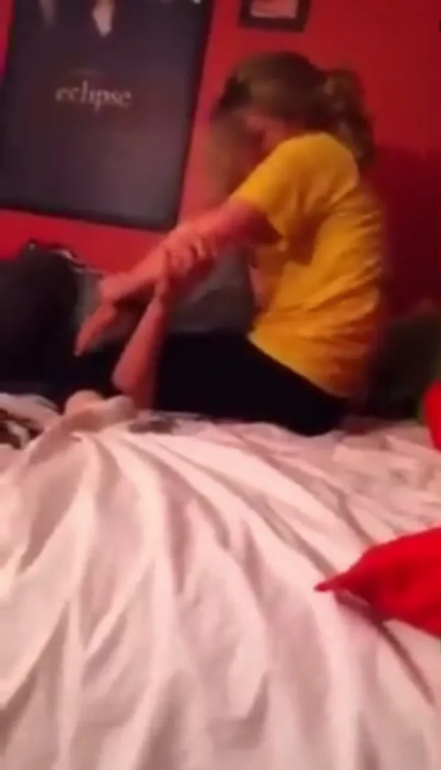 Friends facesit while wrestling