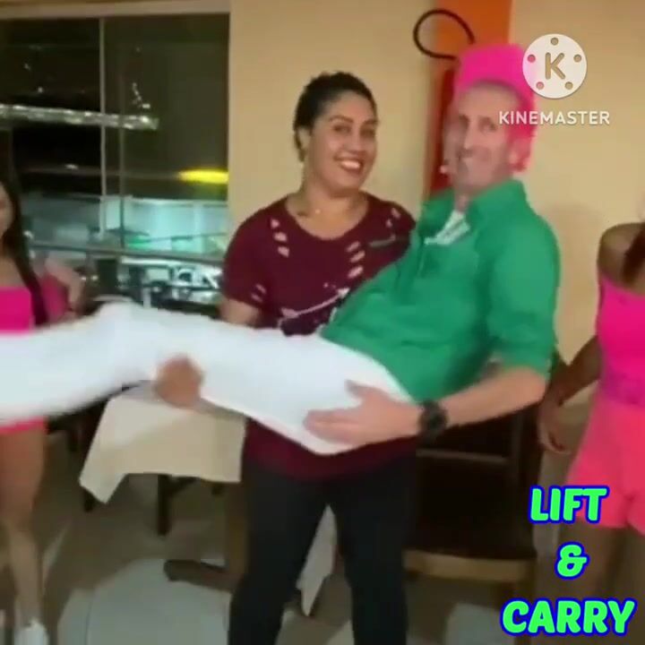 Girls cradle carry man