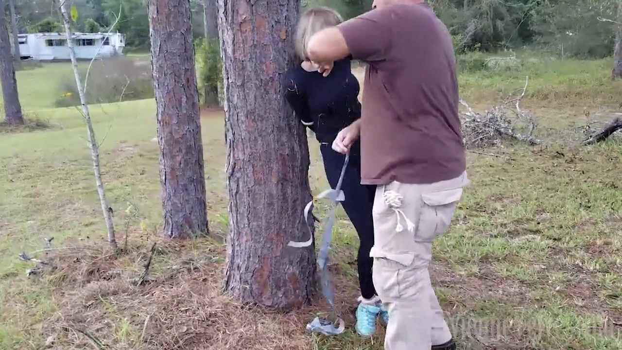 Girl gets tied on a tree