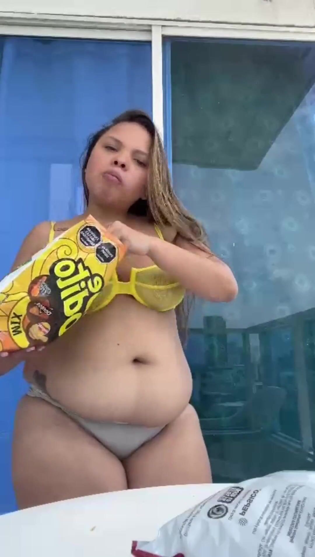 Babylatina1 stuffing herself and showing off her sexy fat body