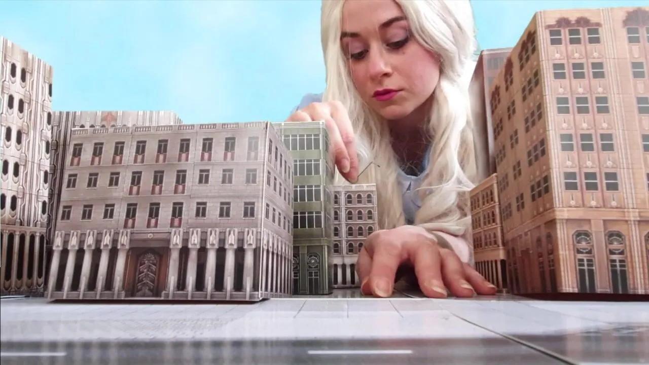 Alice grows and crushes a whole city