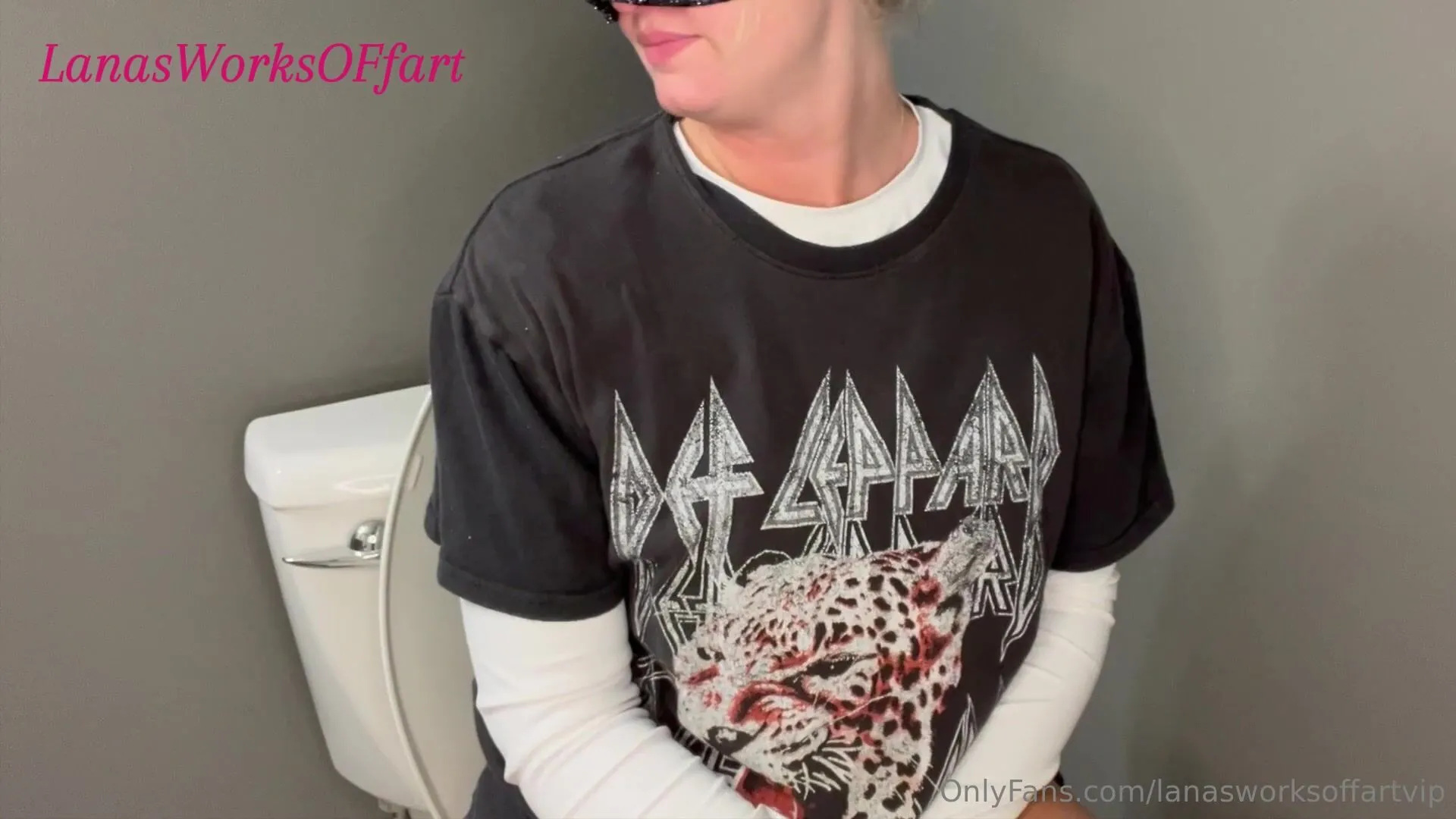 Lana farts on toilet.