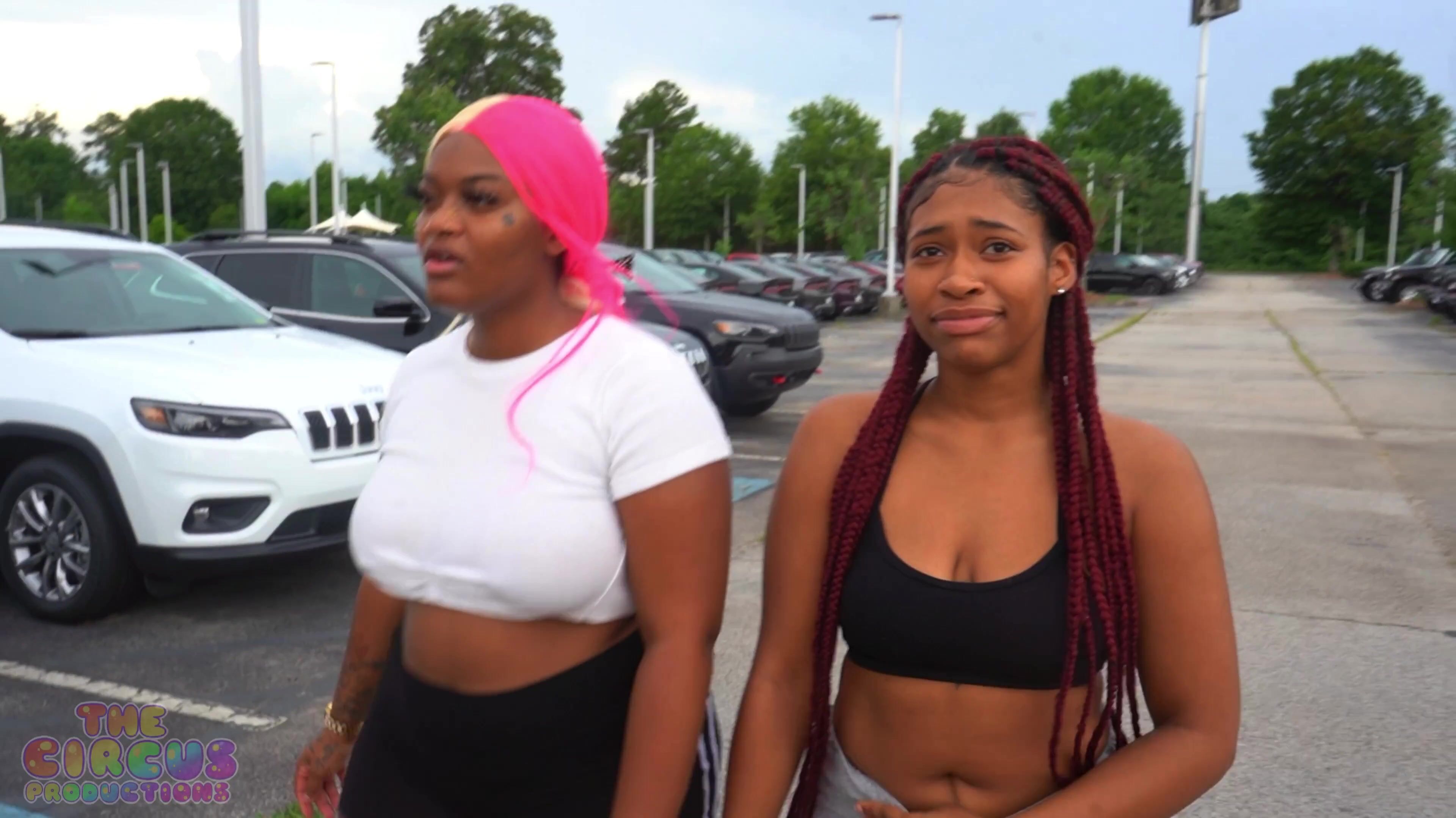 Ebony lesbians in public car lot