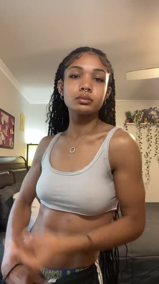 Jordyn Cortjio flexing biceps