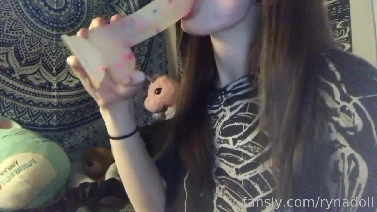 Teenage sucking dildo