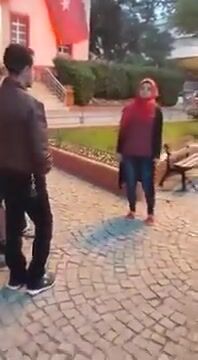 Syrian woman forces man to kiss her feet