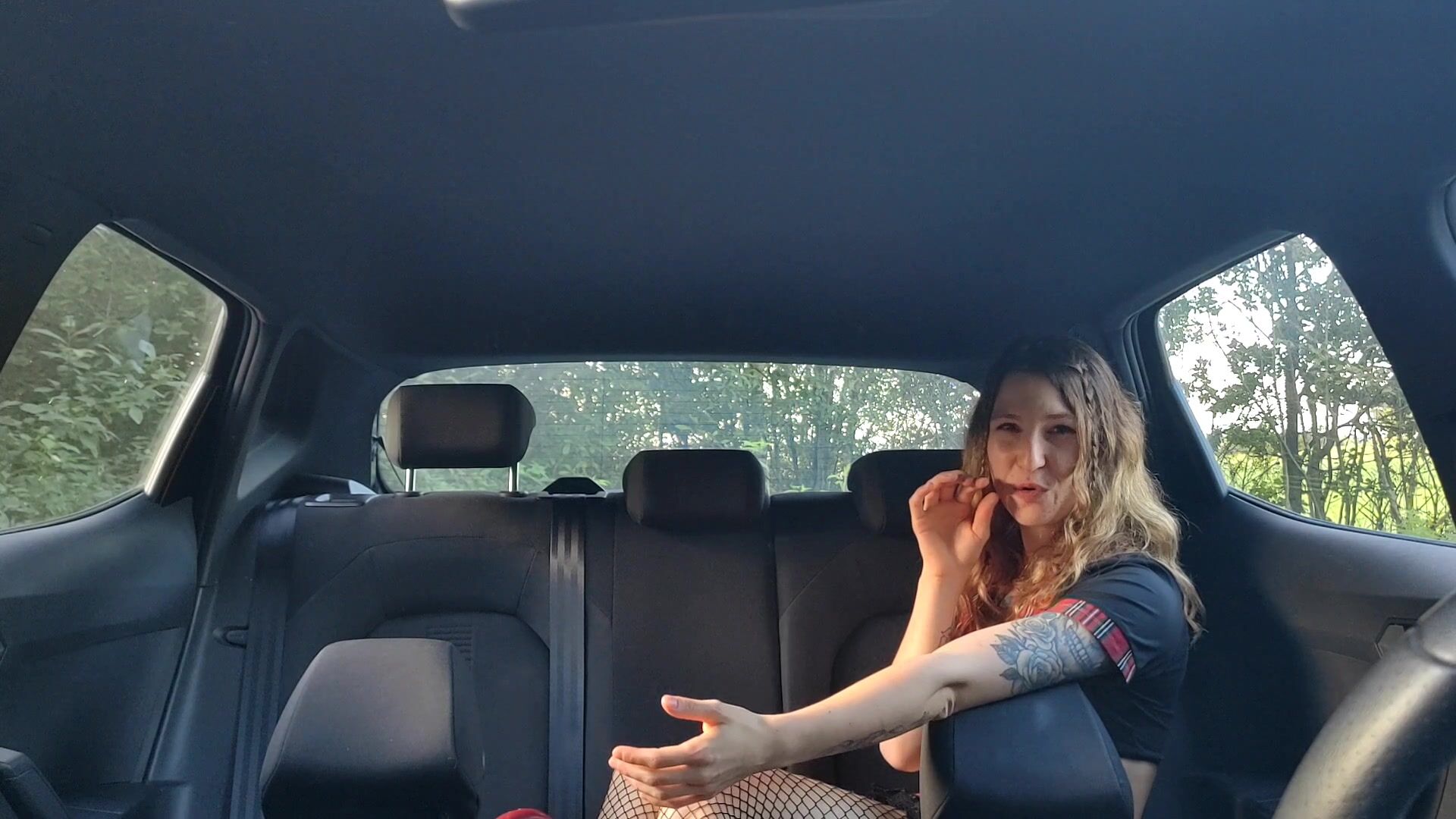 Cute girl blow to pop balloon in car