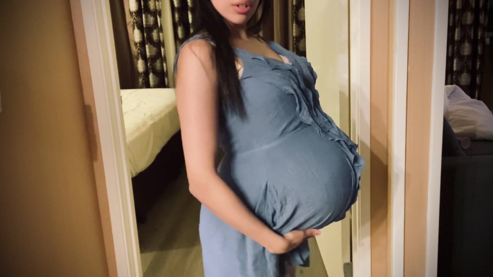 Ember Bastet maternity dress modeling