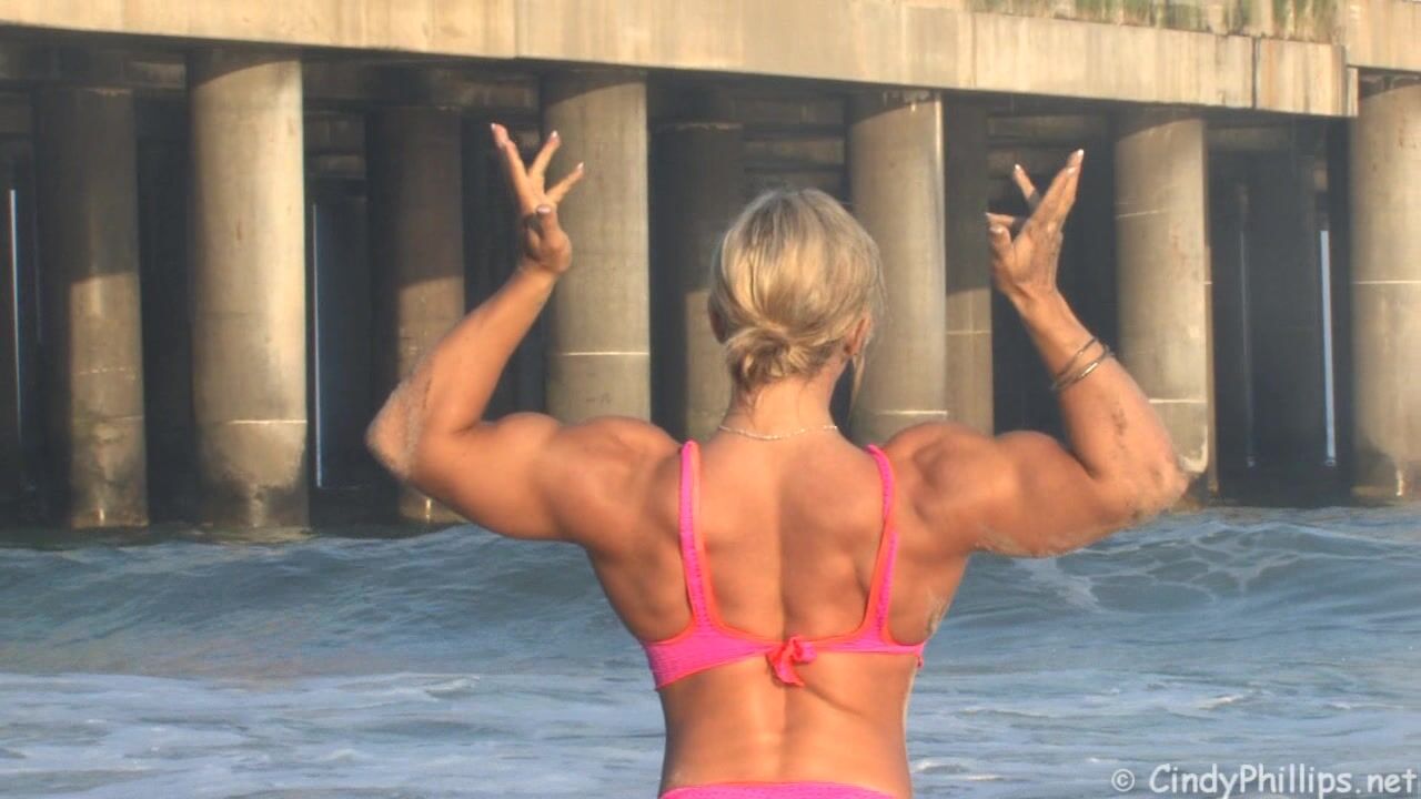 Cindy Phillips posing on a beach