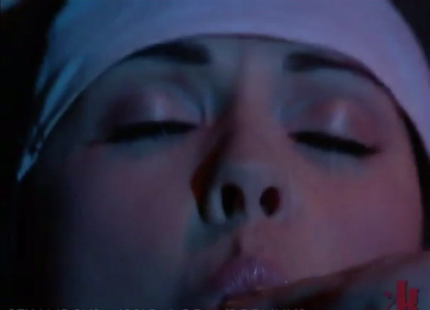 Naughty nun loves her crucifix