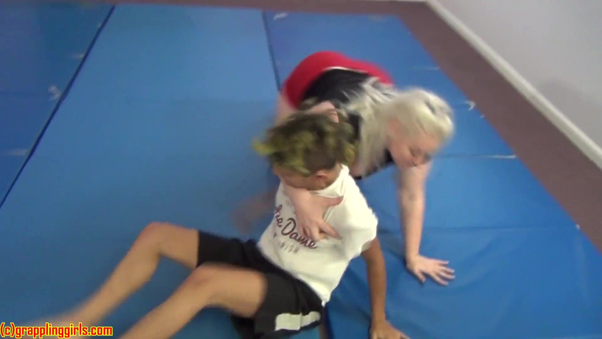 Fat bitch squashing him flat in wrestling match, multiple times