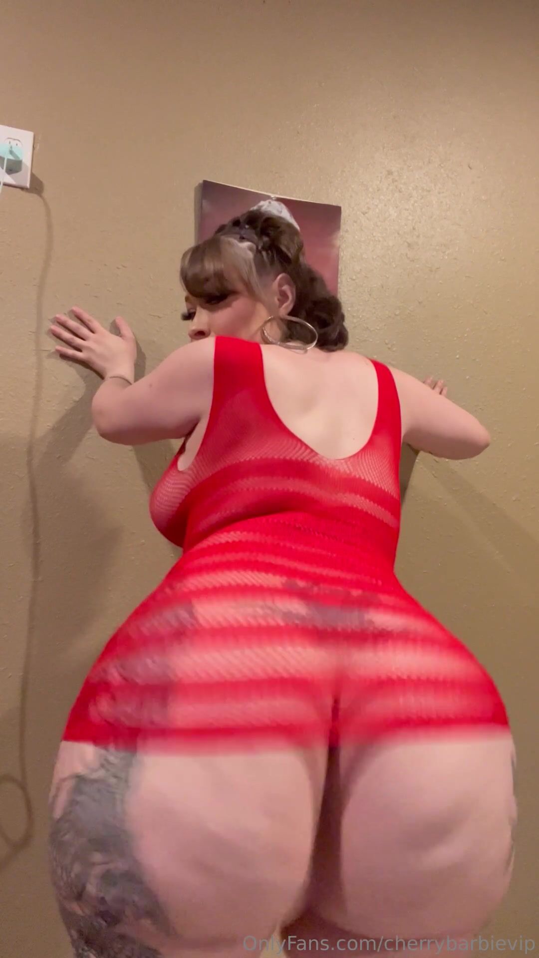 Cherrybarbie in a tight red dress