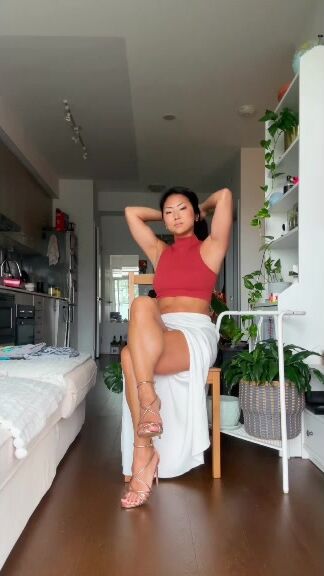 Crossing sexy legs with split skirt