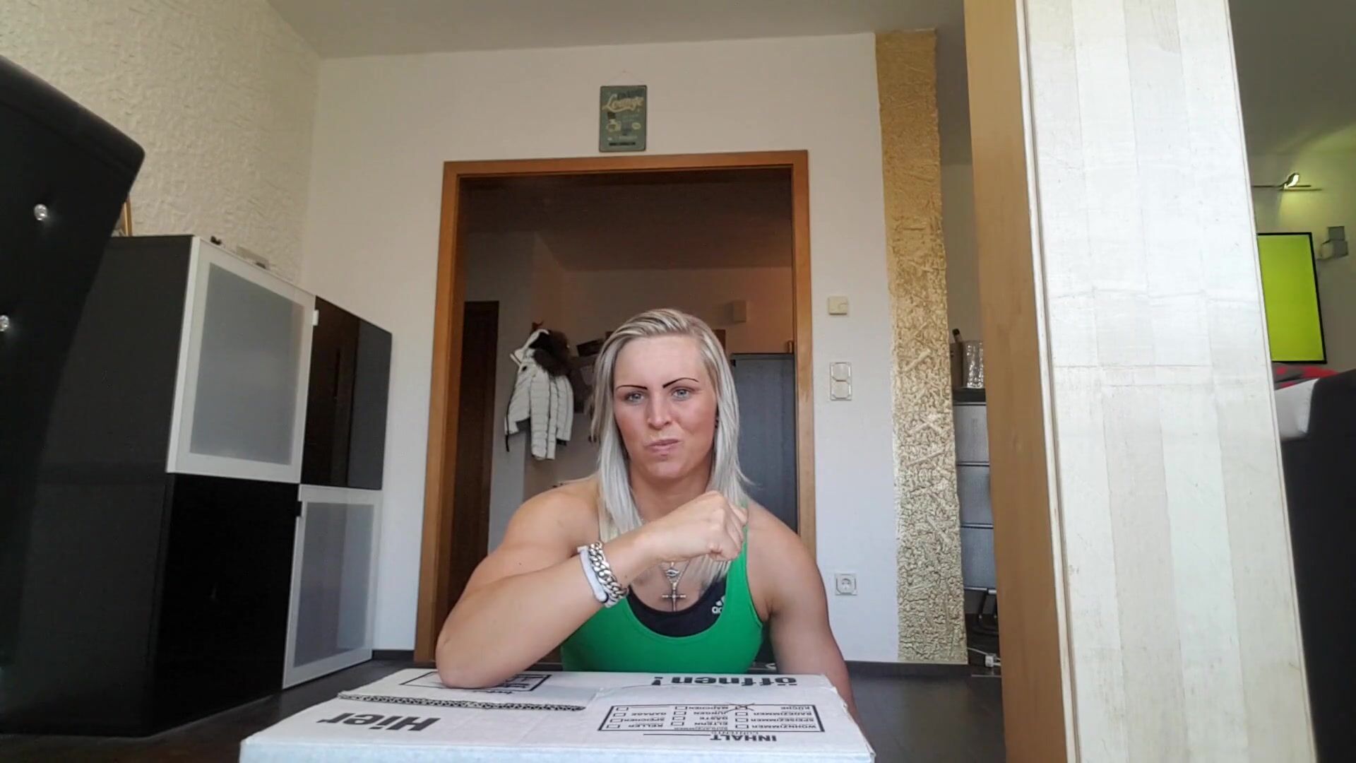 Anna armwrestling at home
