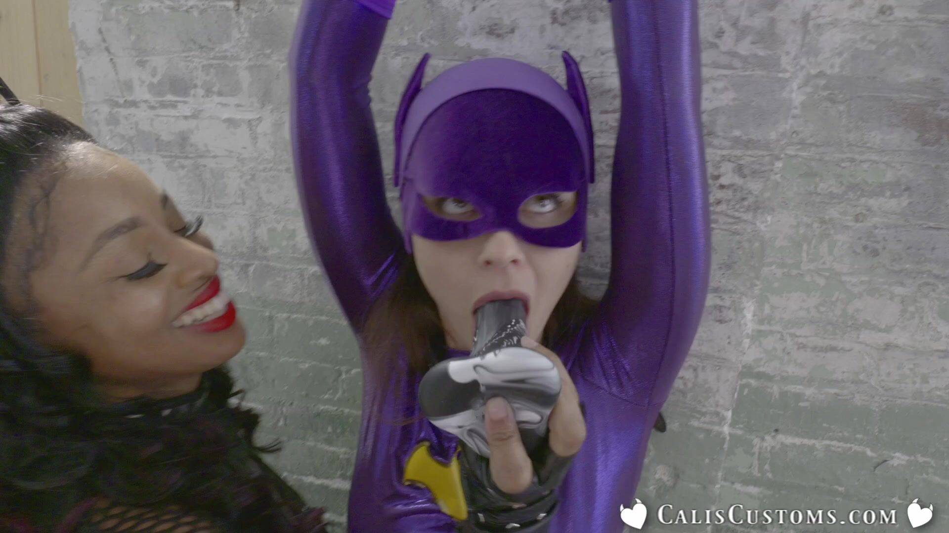 Catgirl_dominates_Batgirl_into_sexual_submission