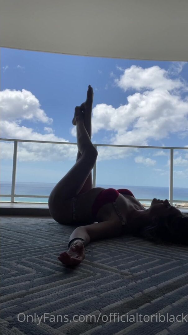 Tori posing on balcony
