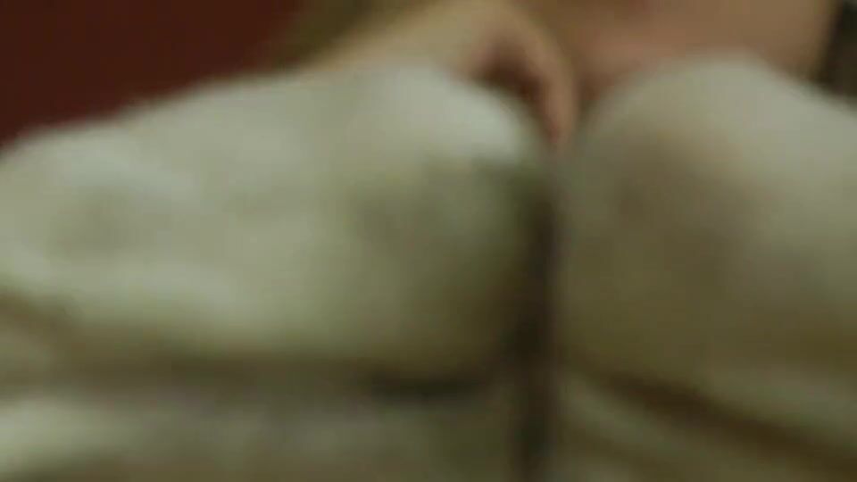 The blonde shows off her dirty white socks feet