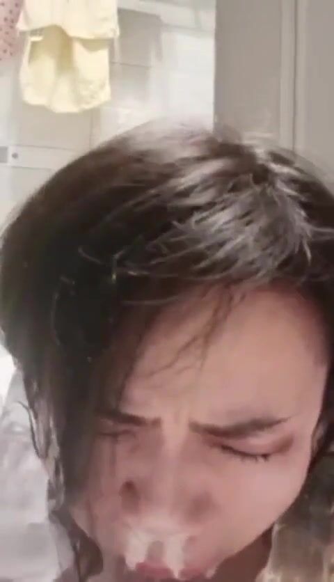 Asian Puking on dildo in bath