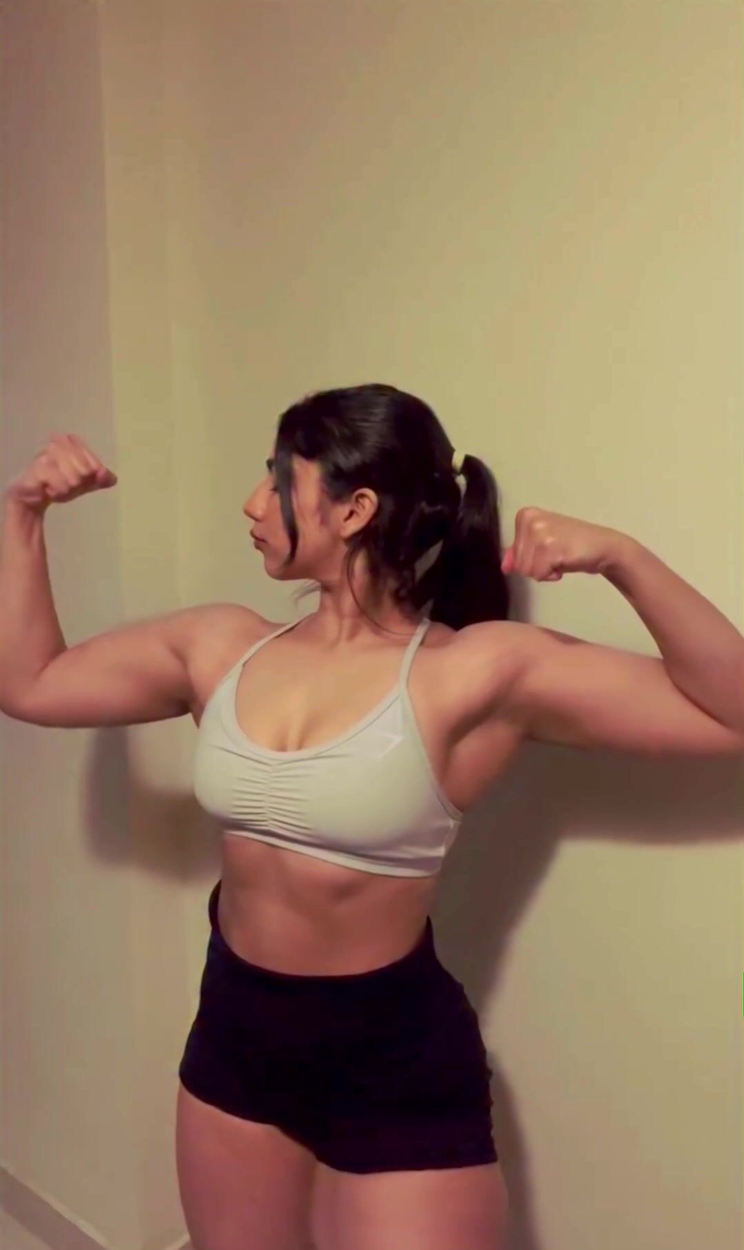 Exotic Indian teen flexing
