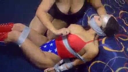 Wonder woman tied up and handbag bounty