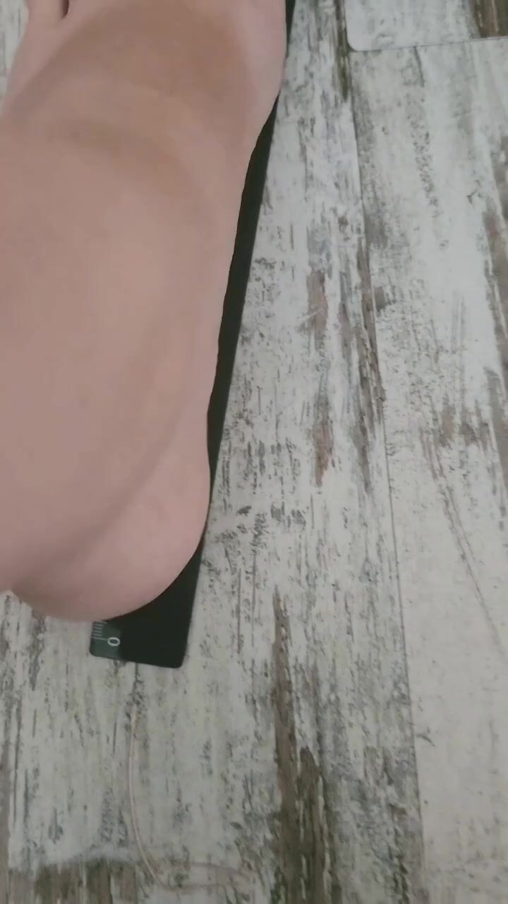Girl Measuring her Huge feet