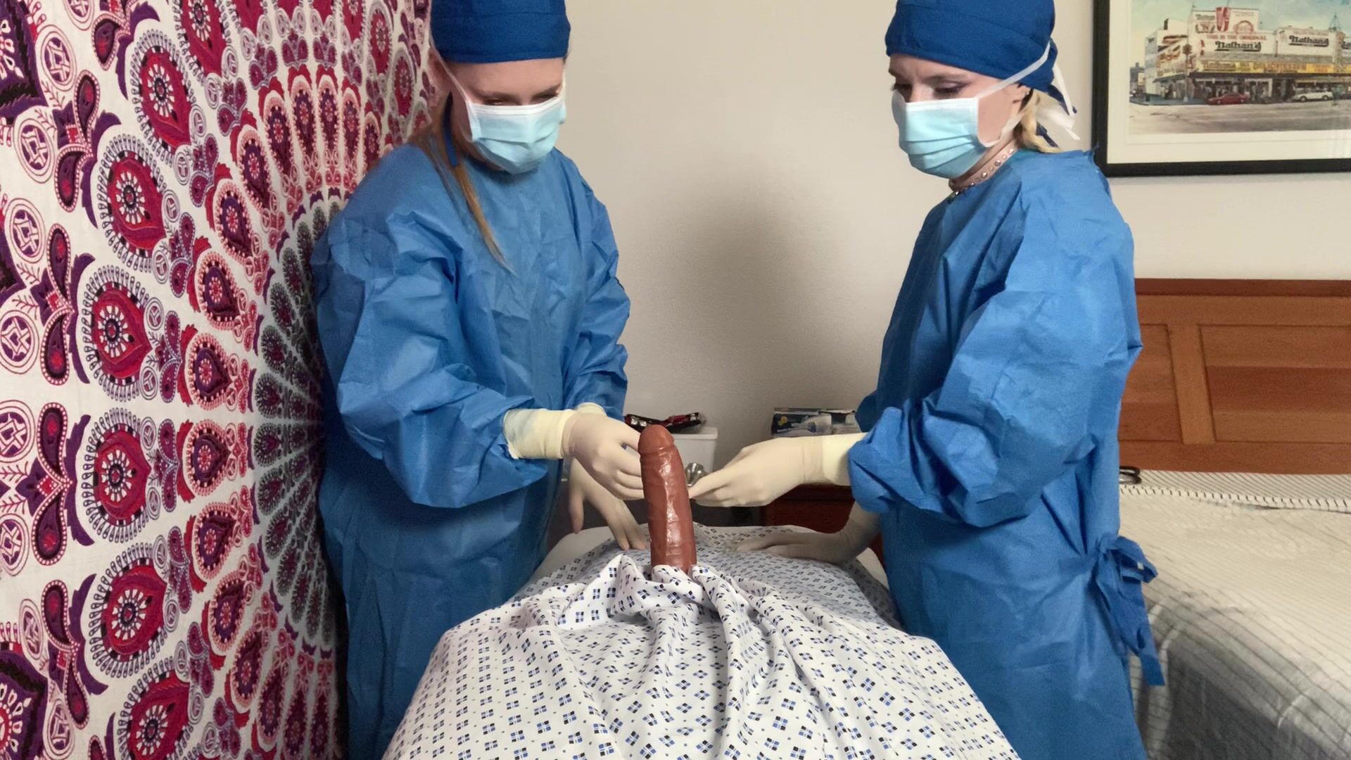 2 surgical doctors give a handjob