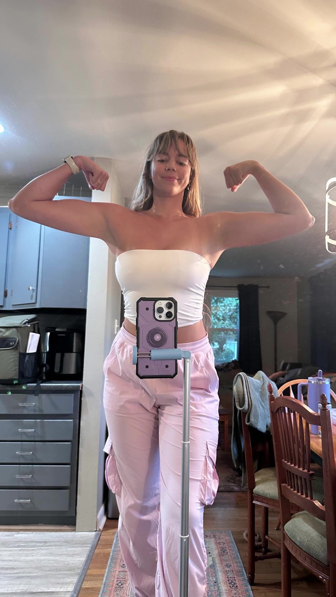 Tall Natasha Barnz shows off her muscular body