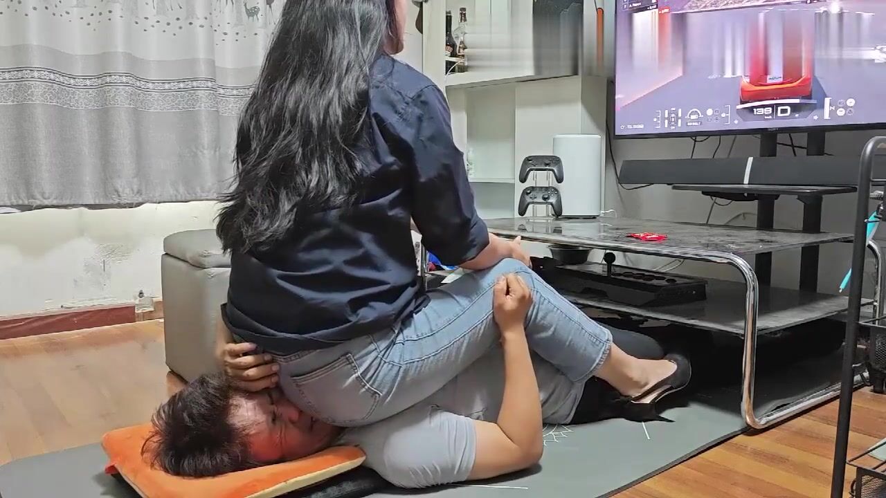 Asian facesitting human chair