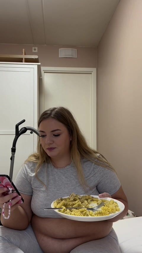 Maggie stuffs herself with pasta