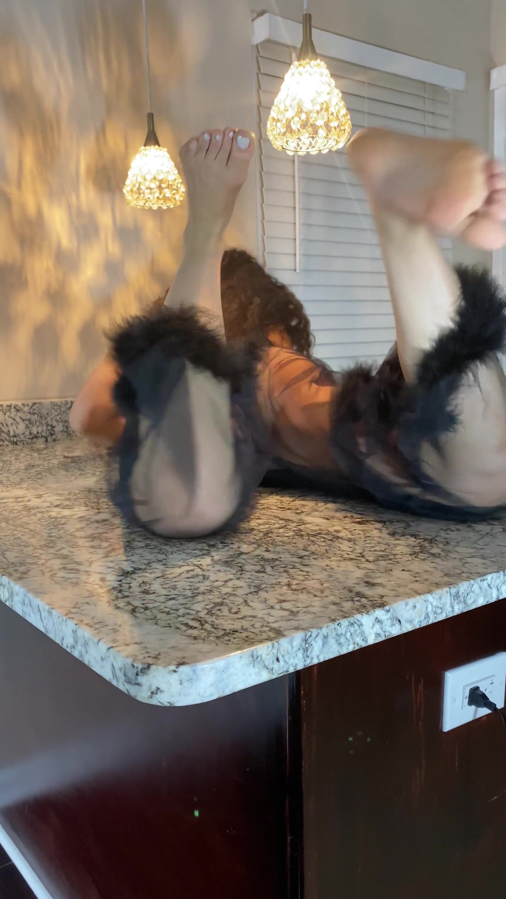 curled hair girl feet