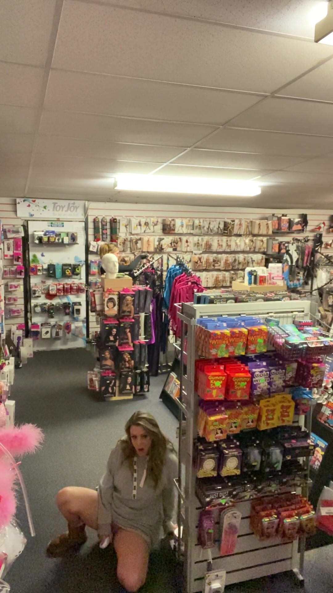 Masturbating infront of people out in the open in sex shop