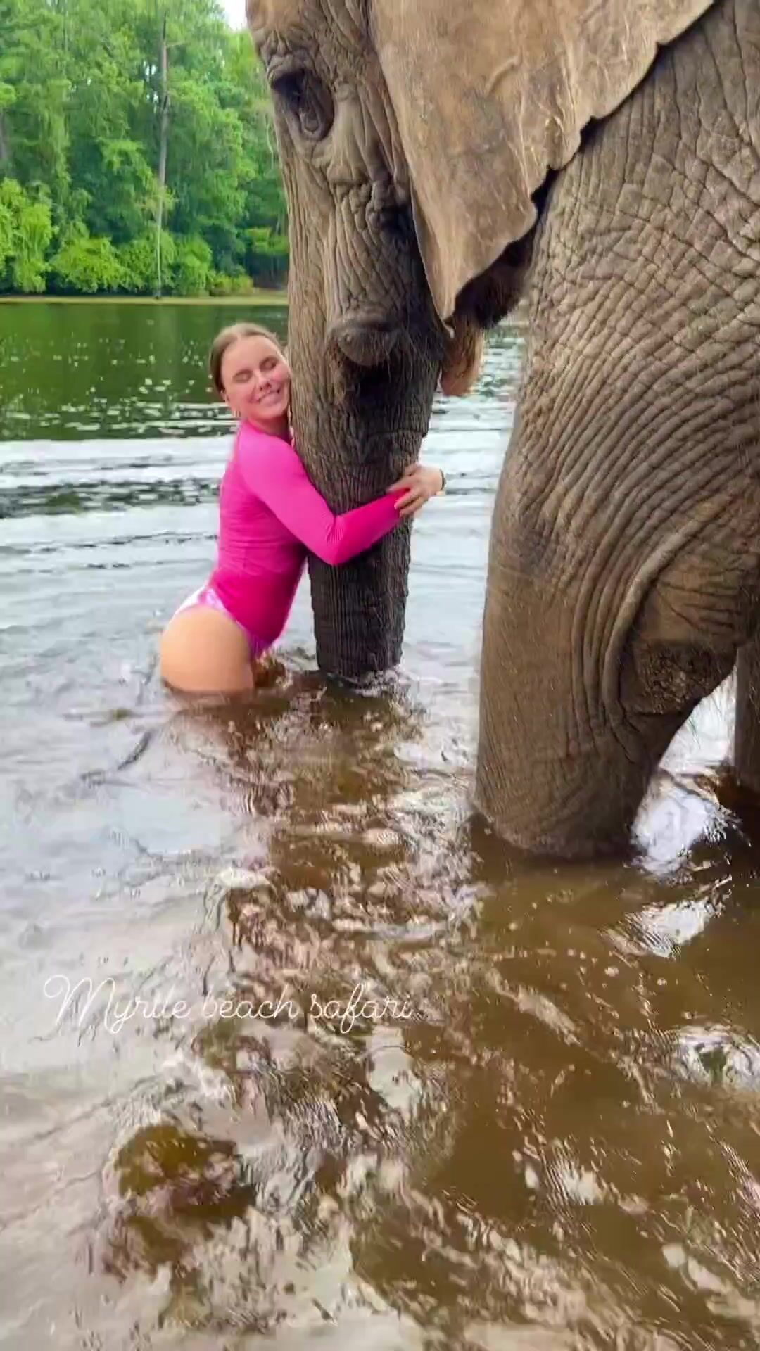 Sexy girl - Playing with her elephant