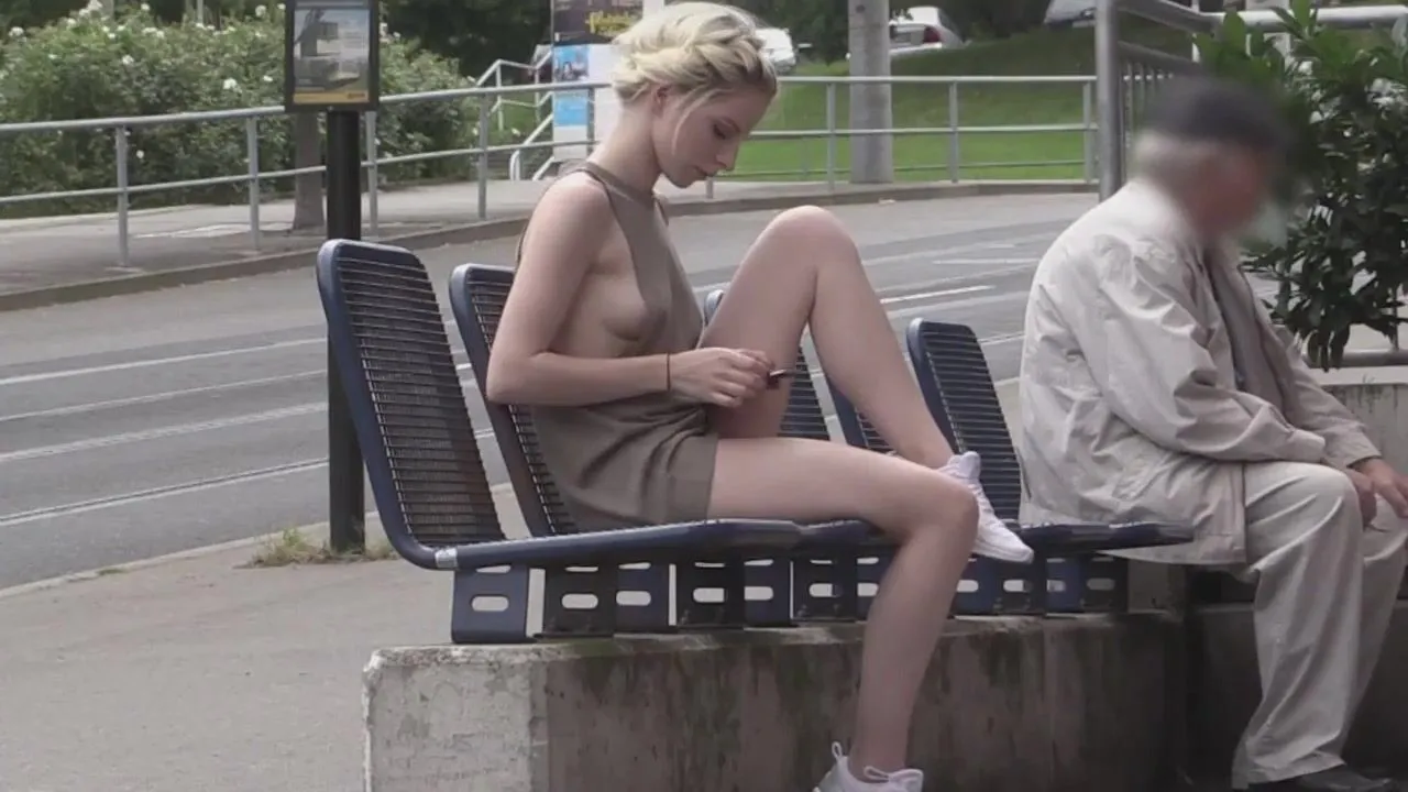 Beautiful girl exposing herself in public