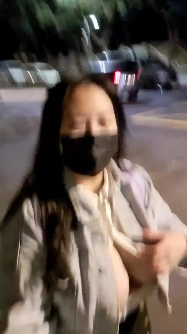 Showing big boobs in public road