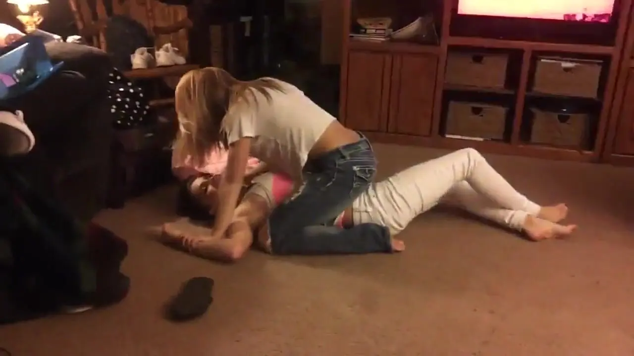 2 Girls wrestle in livingroom