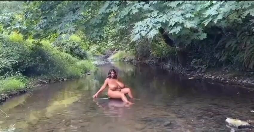 Maserati in a river