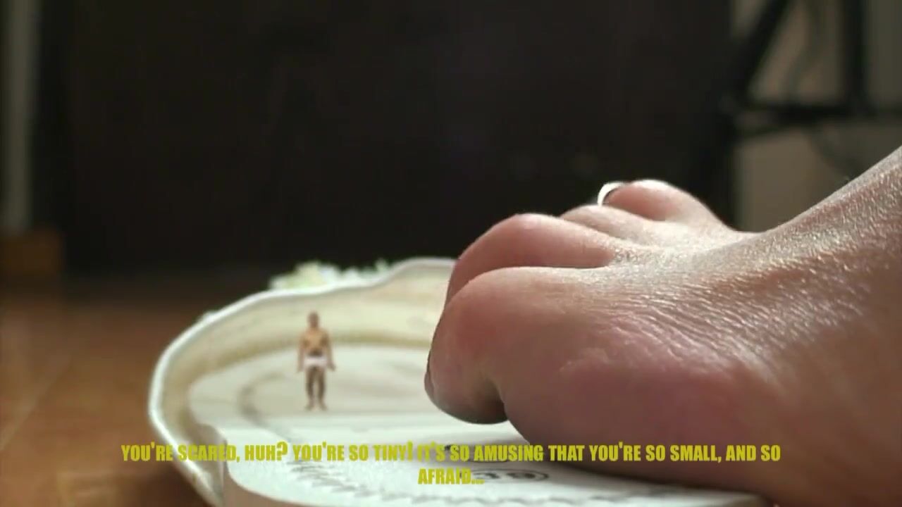 Giantess Dancia Traps tiny in sandal