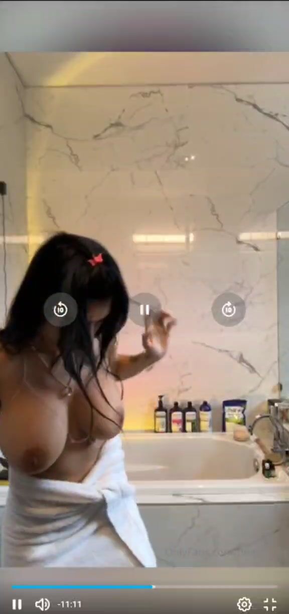 Mia Khalifa topless in bathroom onlyfans video
